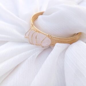 Elegant gold plated modern kara baracelet with white gemstone